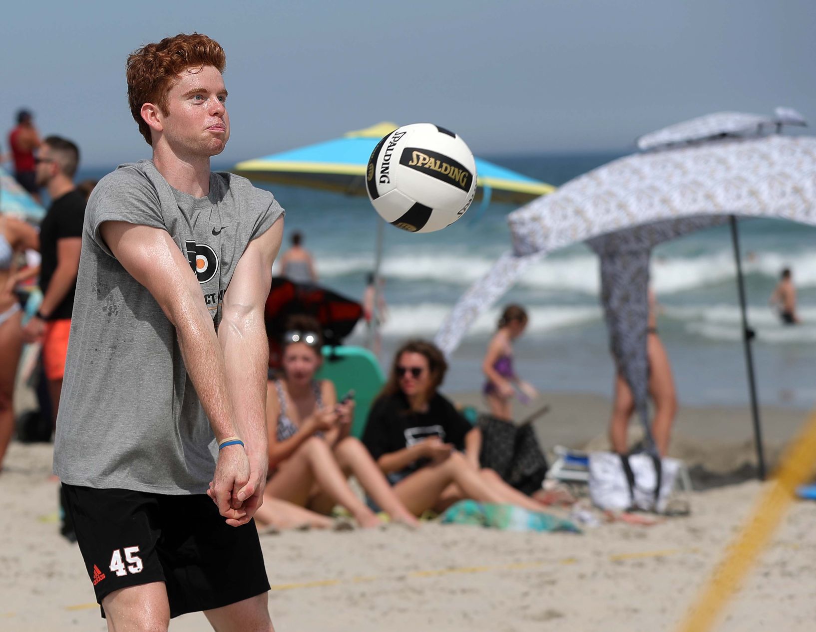 Philadelphia Flyers prospects sign autographs and play volleyball